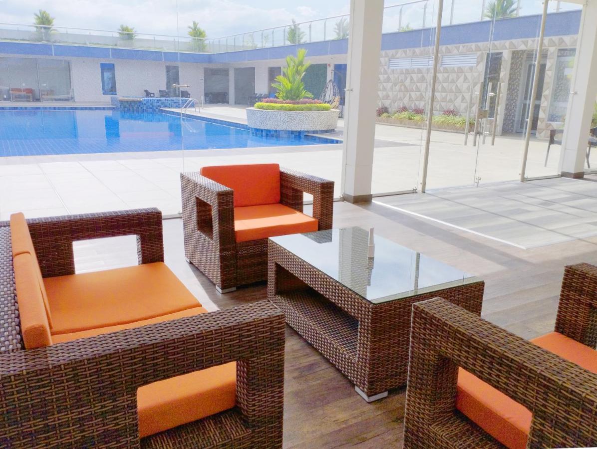 Hotel Royal Elim International San Antonio  Exterior foto WOVEN PE rattan