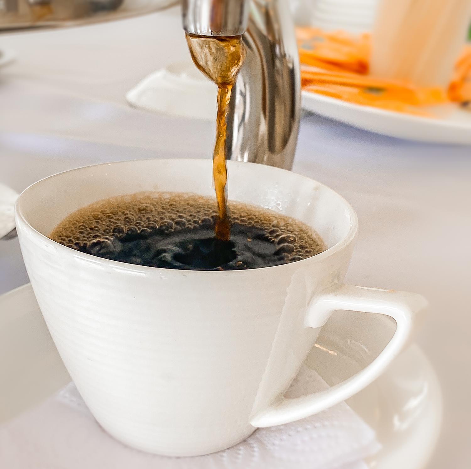 Hotel Royal Elim International San Antonio  Exterior foto Coffee being poured